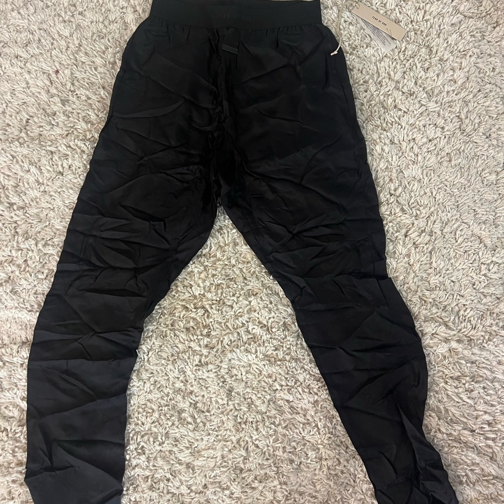 FEAR OF GOD silk lounge pants.